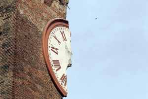 A damaged old tower is seen after an earthquake in Finale Emilia